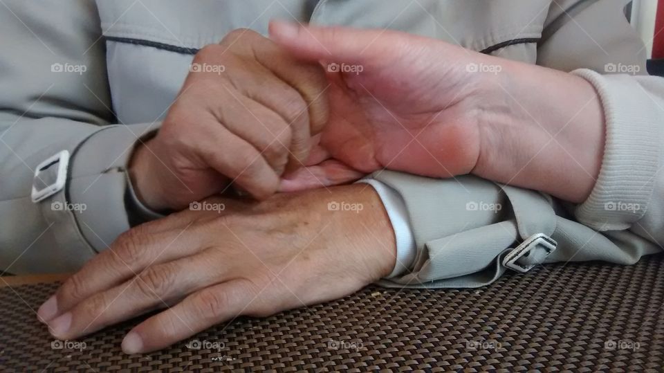 Couples holding hand