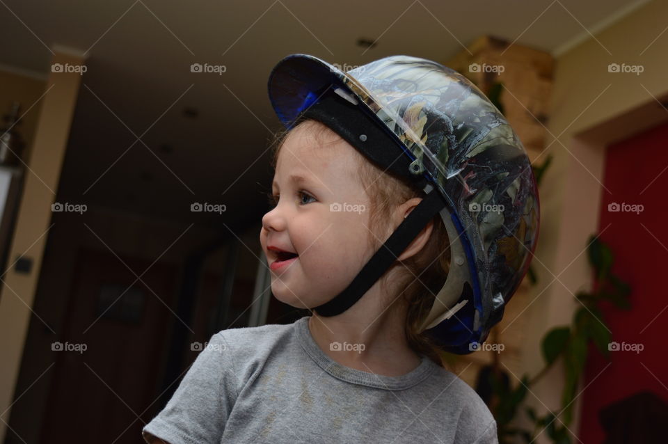 Child in a unique helmet