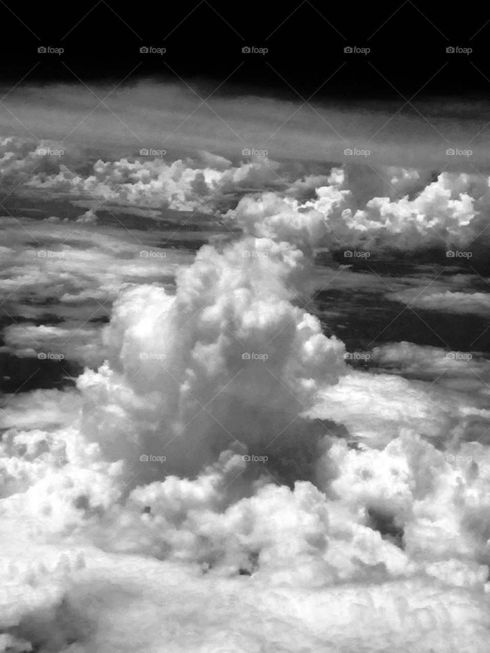 Traveling by air, I gazed down in wonder. 