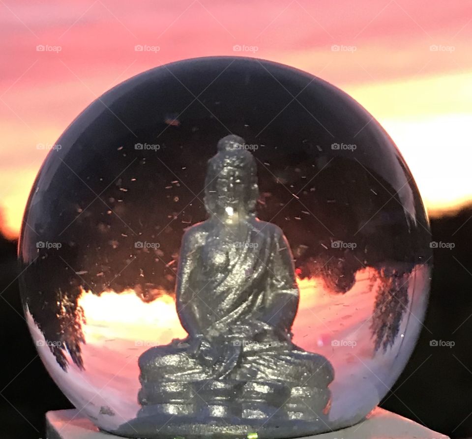 Crystal ball, sunset, budha