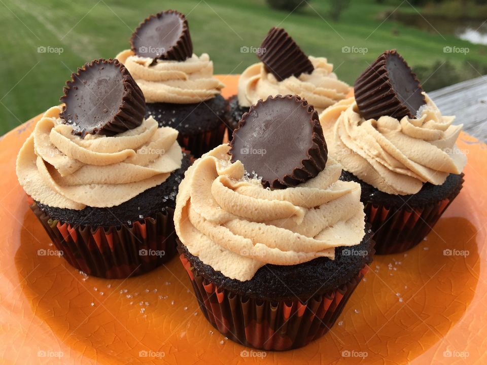 Chocolate Cupcakes with Peanut Butter Buttercream Icing topped with a Peanut Butter Cup