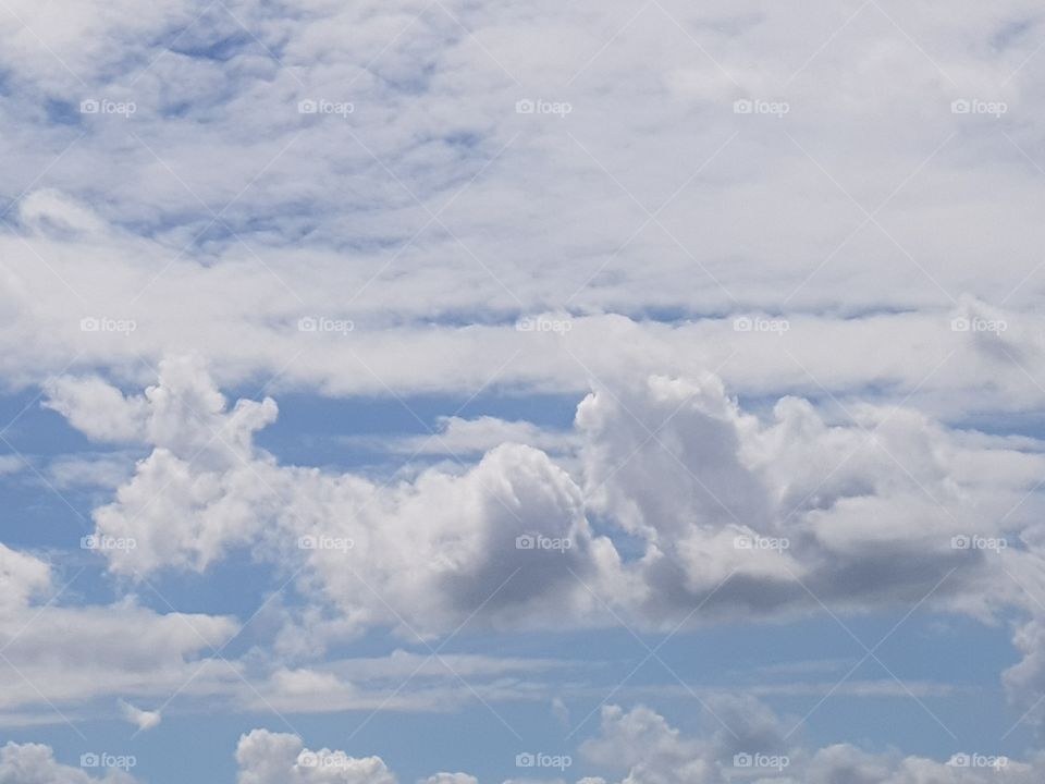 Beautiful blue sky with particularly beautiful white clouds. fantasy