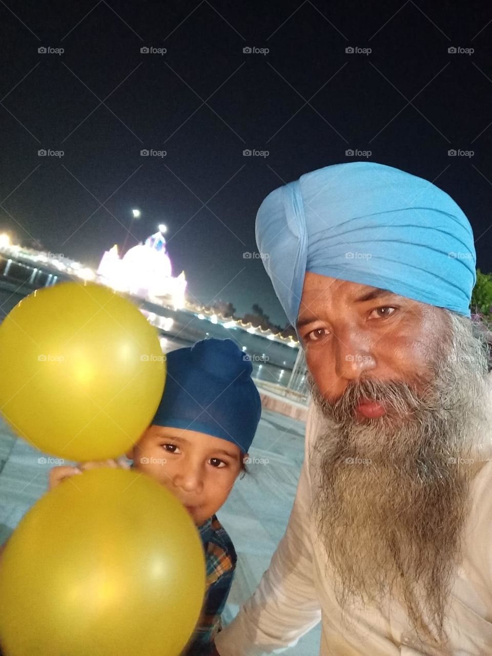 father and child at religious temple