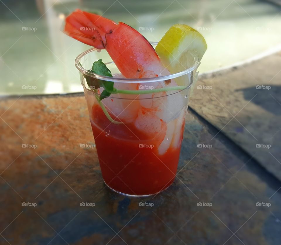 Fresh Succulent Shrimp Cocktail appetizer with fresh lemon