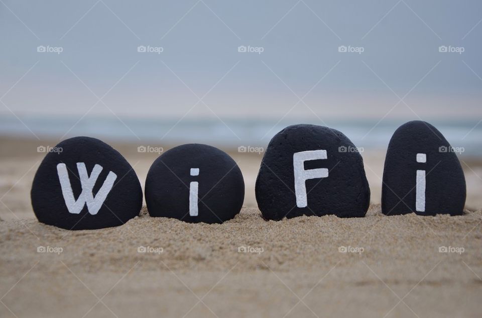 Wi Fi concepy on black stones