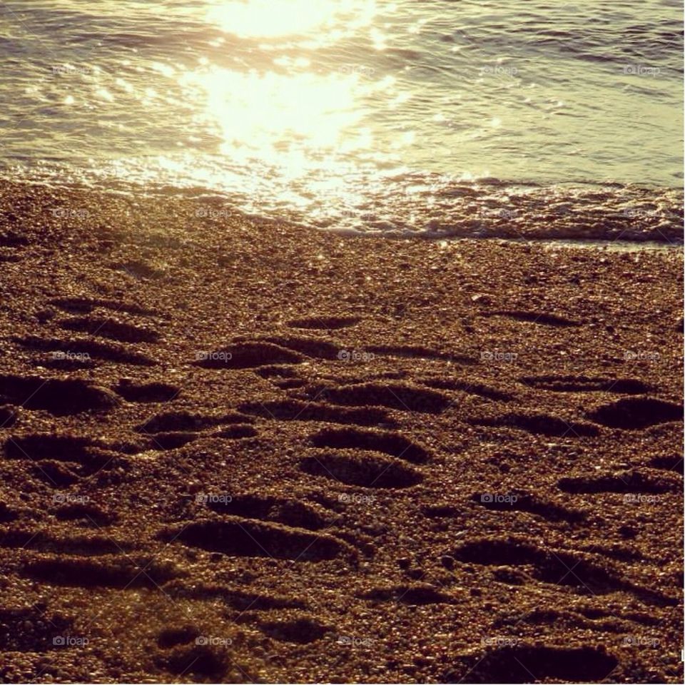 Foot prints in the sand