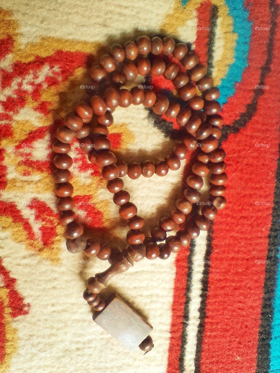 This is a wooden prayer beads that Muslims use to recite Allah