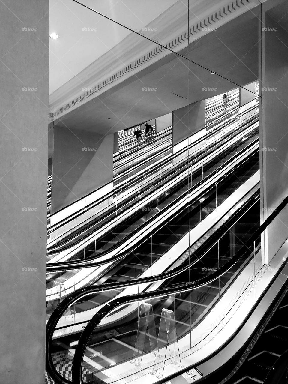 A view of escalators which incorporates a study of lines, angles and reflection. Taken in Cesar's Palace, Las Vegas.