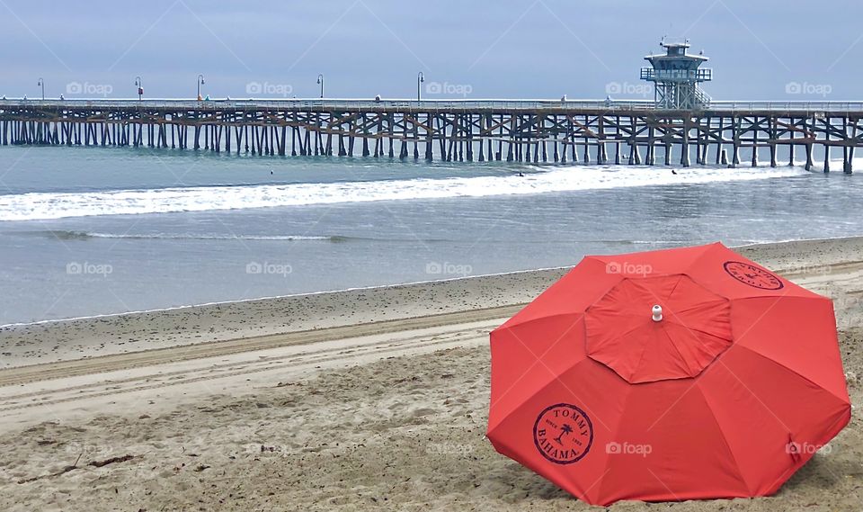 Foap Mission “Seeing In Circles!” Beautiful Red Umbrella With Pier in The Background!