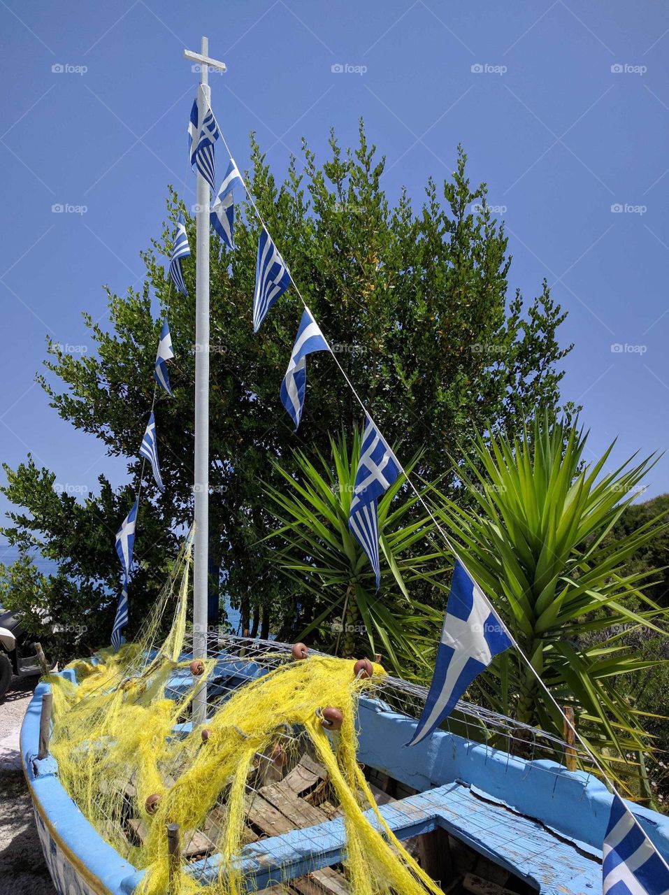 Greek Flags on Retired Boat