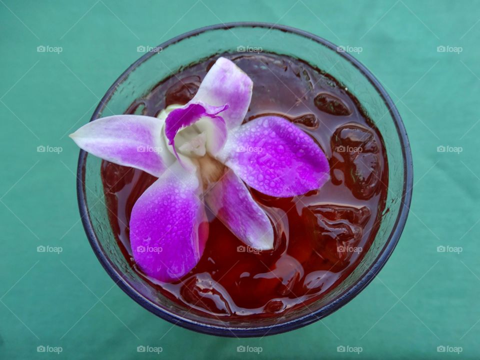 Mai Tai Cocktail Decorated With Purple Orchid