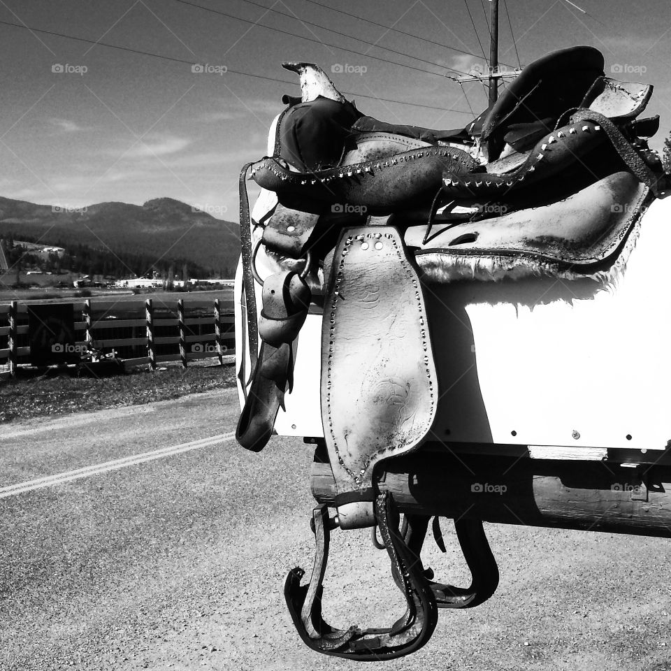 pony express. old saddle on a mail box