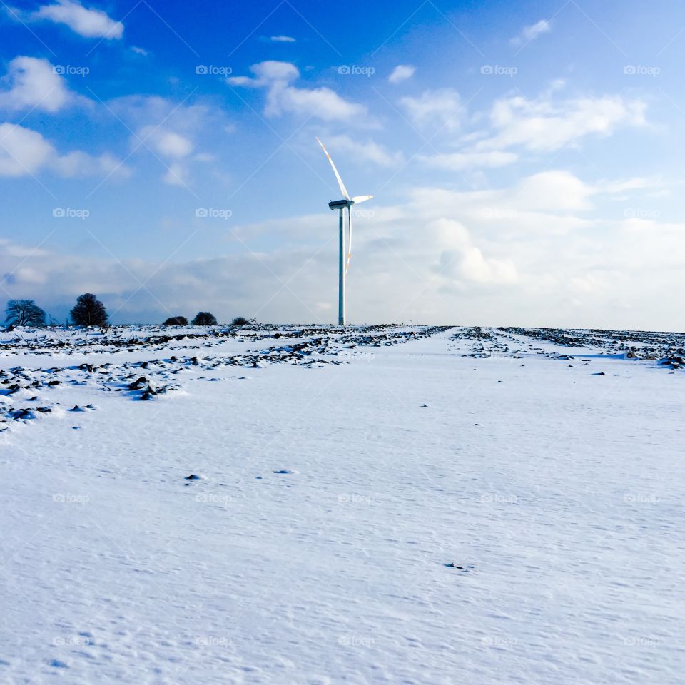 Windmill at winter alndscape