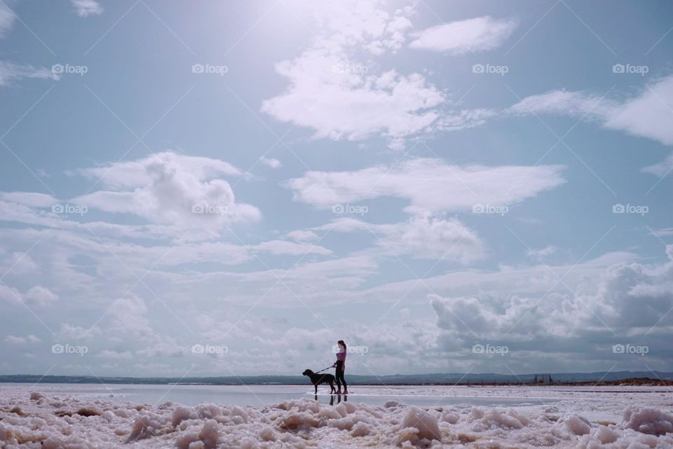 Salt#lagoon#human#dog#sky#clouds