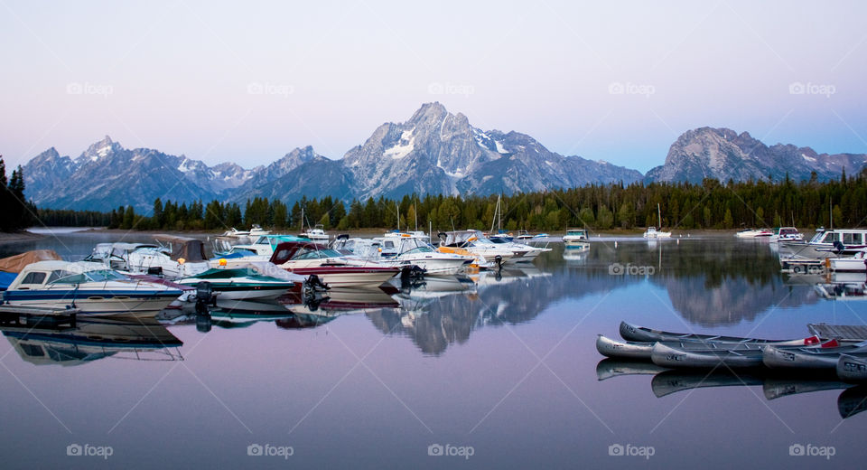 Boats moored in Jackson Lake, Wyoming, USA