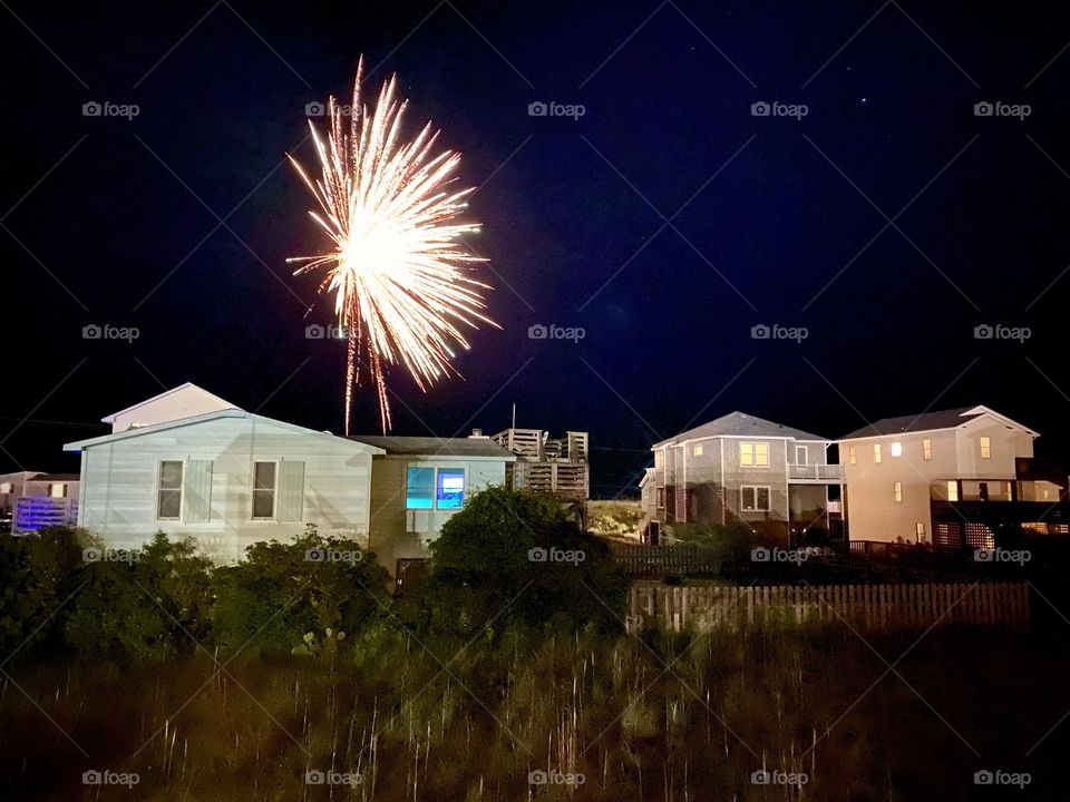 Summer nights with fireworks over the ocean. 
