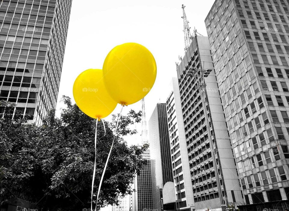 Yellow baloon flying
