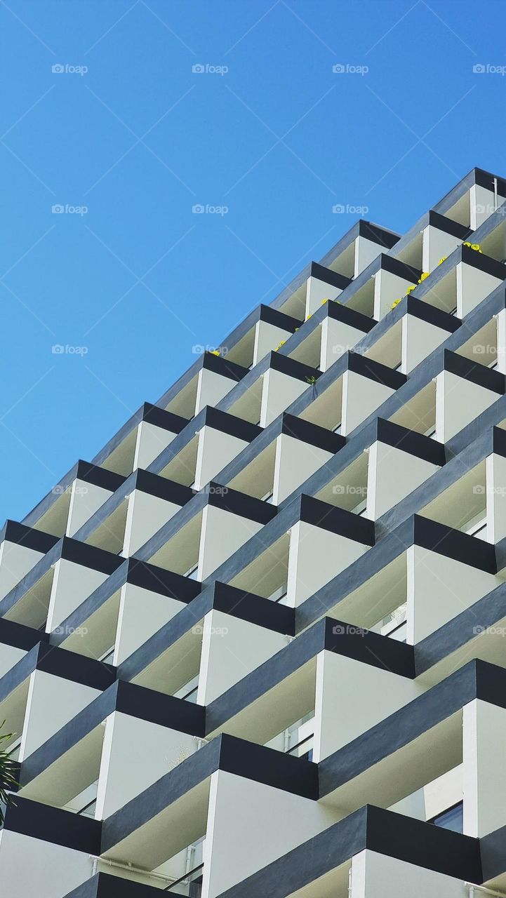 A podium of windows. Abstract architecture