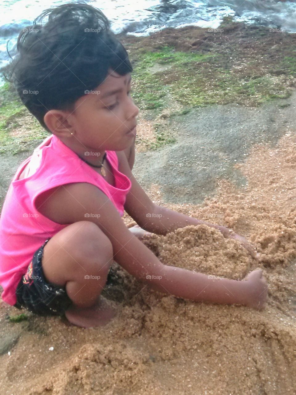 Playing with sand