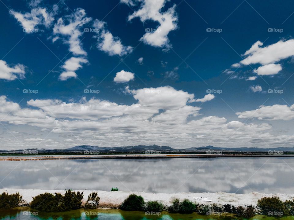 Sky reflects in a salt lake