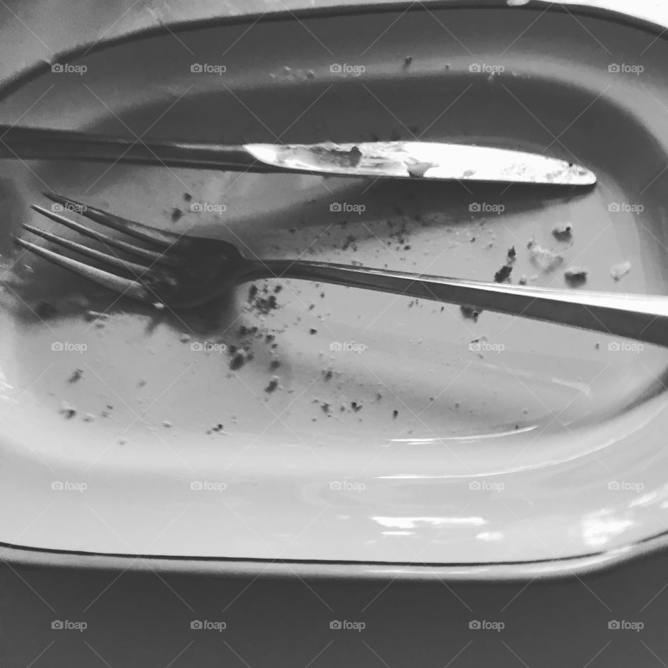 After food empty plate with knife and folk