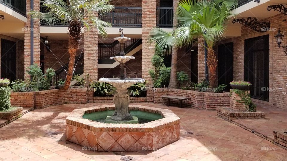 A watwr fountain in the foyer area of the Escape the Room in Houston Texas.