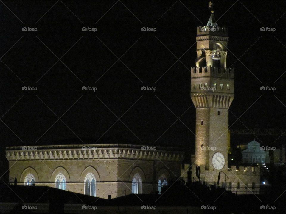 Night view of Italian clock tower 