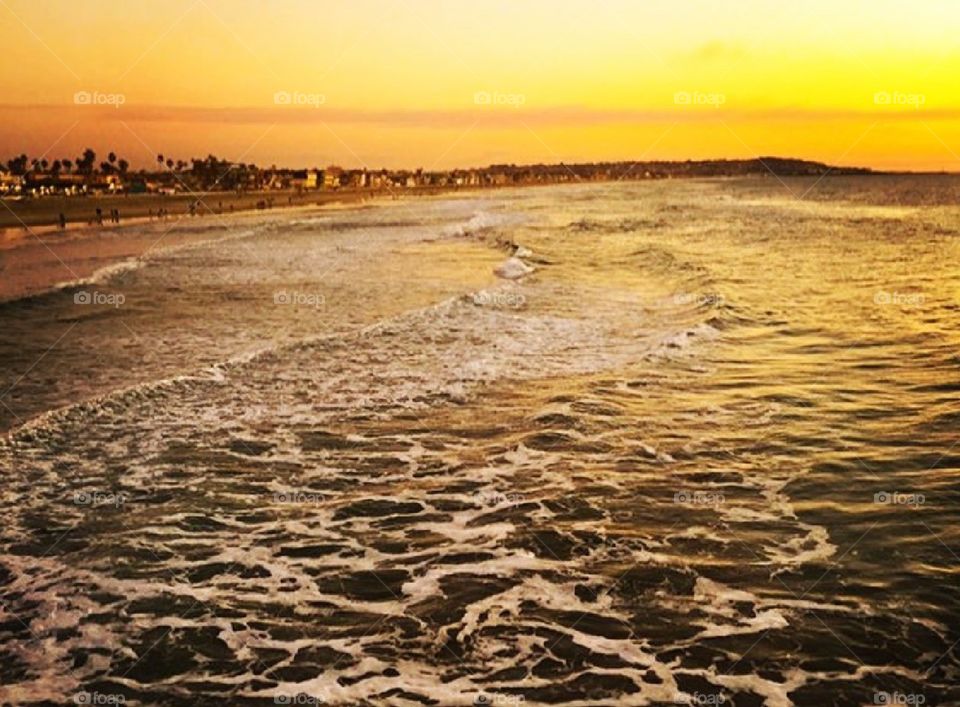 At the beach in San Francisco at sunset. 