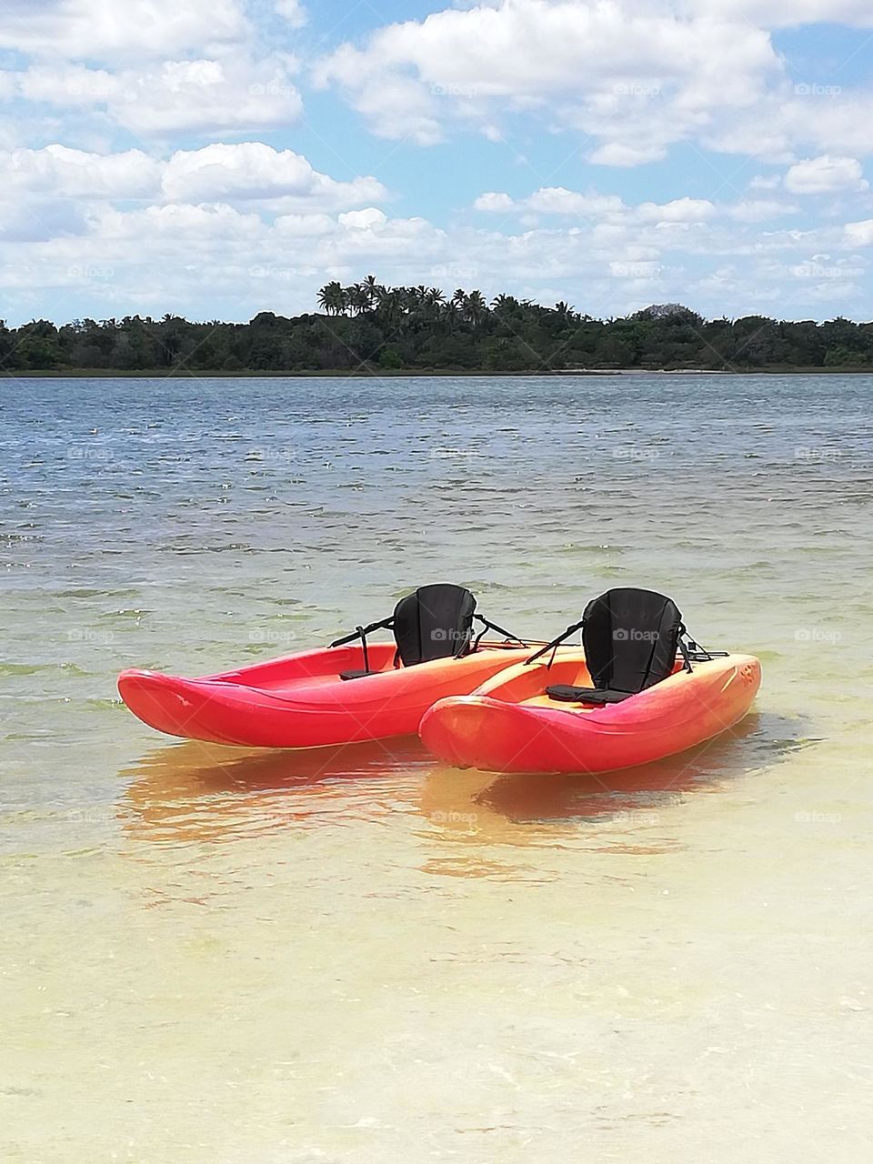 two kayak against panoramic lake view