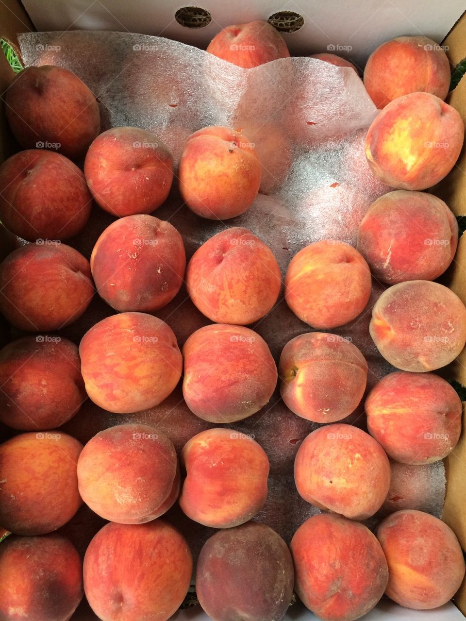 Crate of peaches