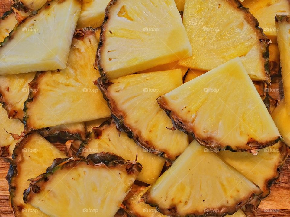 Full frame of sliced pineapple