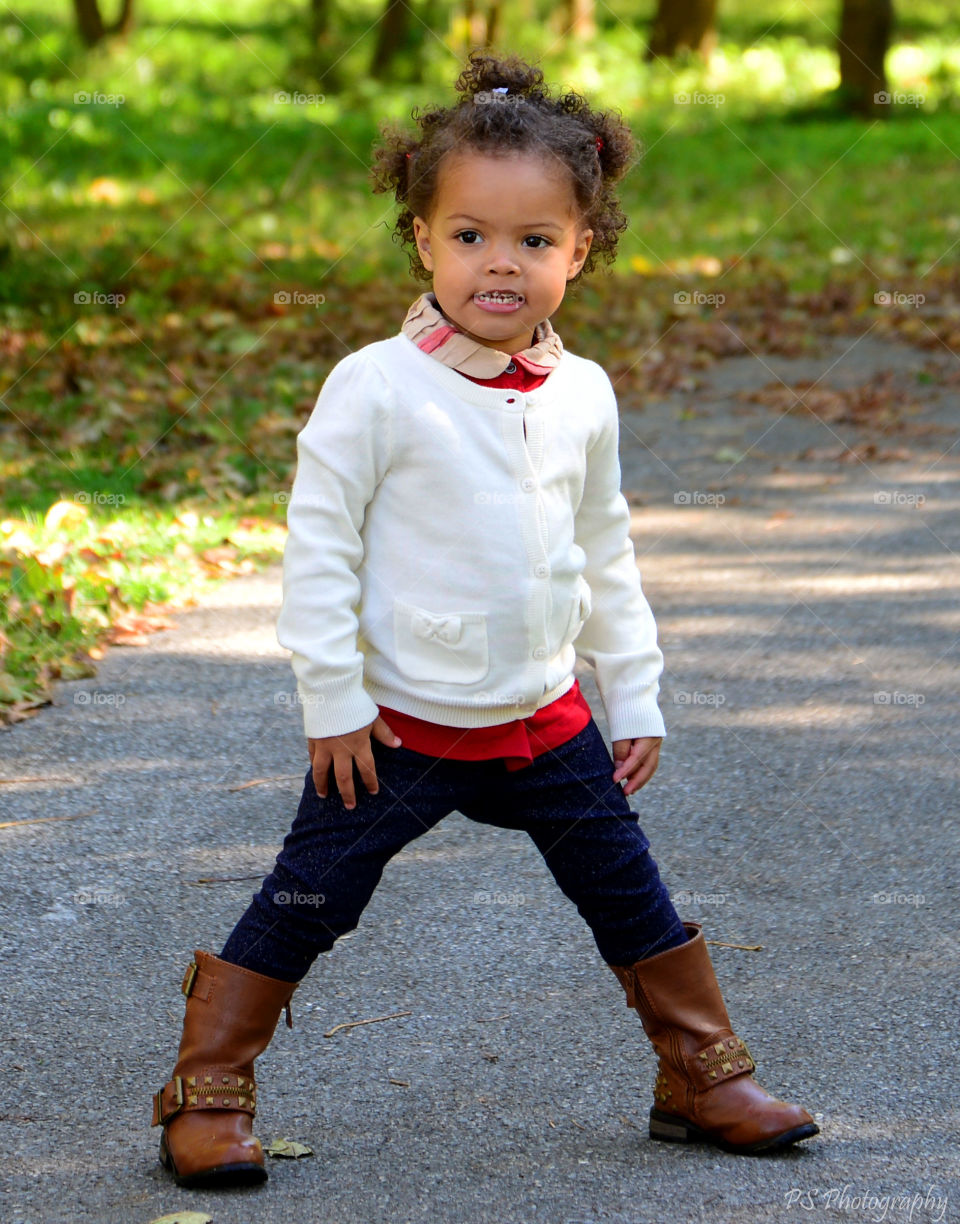 Pretty girl standing on street