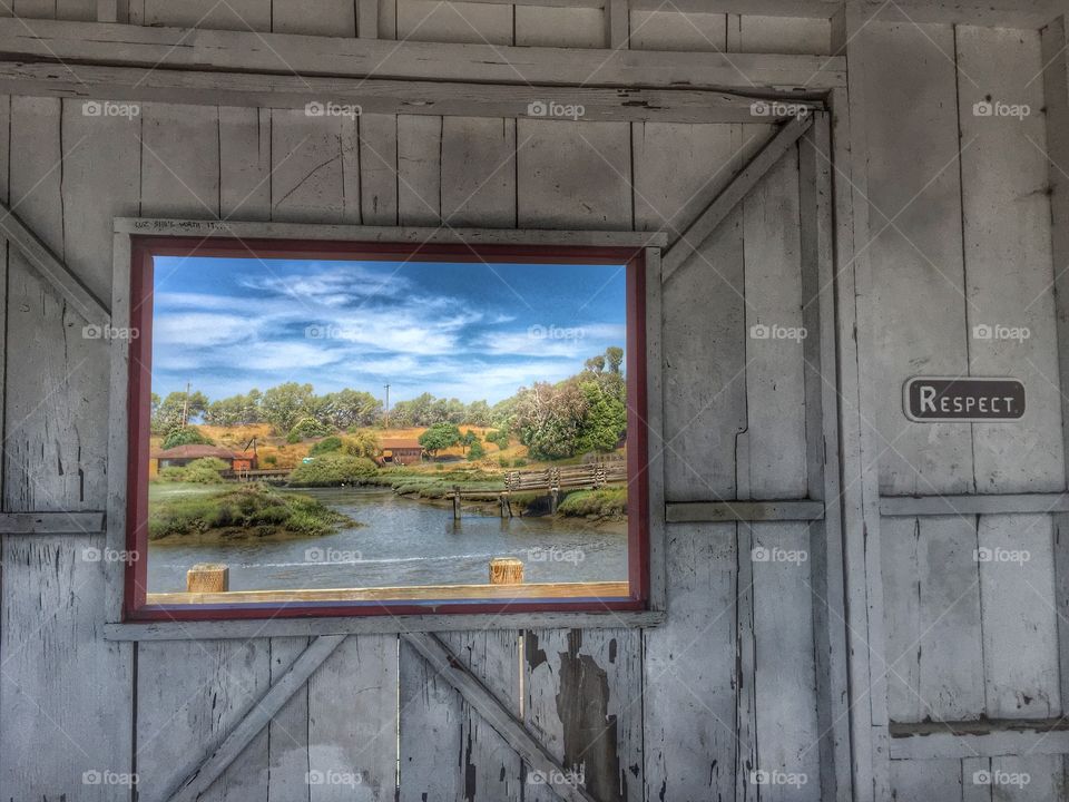 Natural frame. Window of an old picnic area