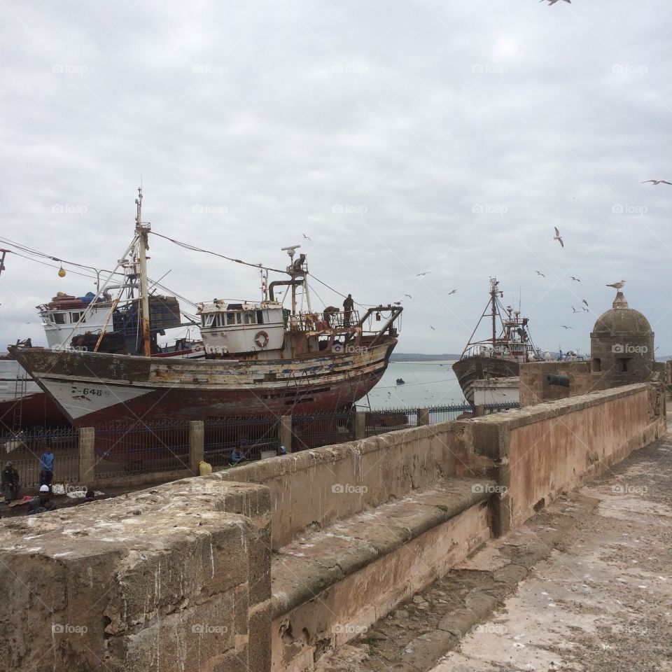 Fishing boats in Essaouria . Fishing boats on the coast of Morocco, in a town called Essaouria where Game of Thrones was filmed