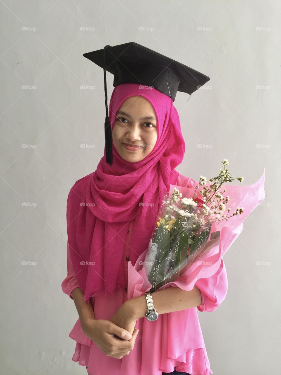 graduation in pink costume