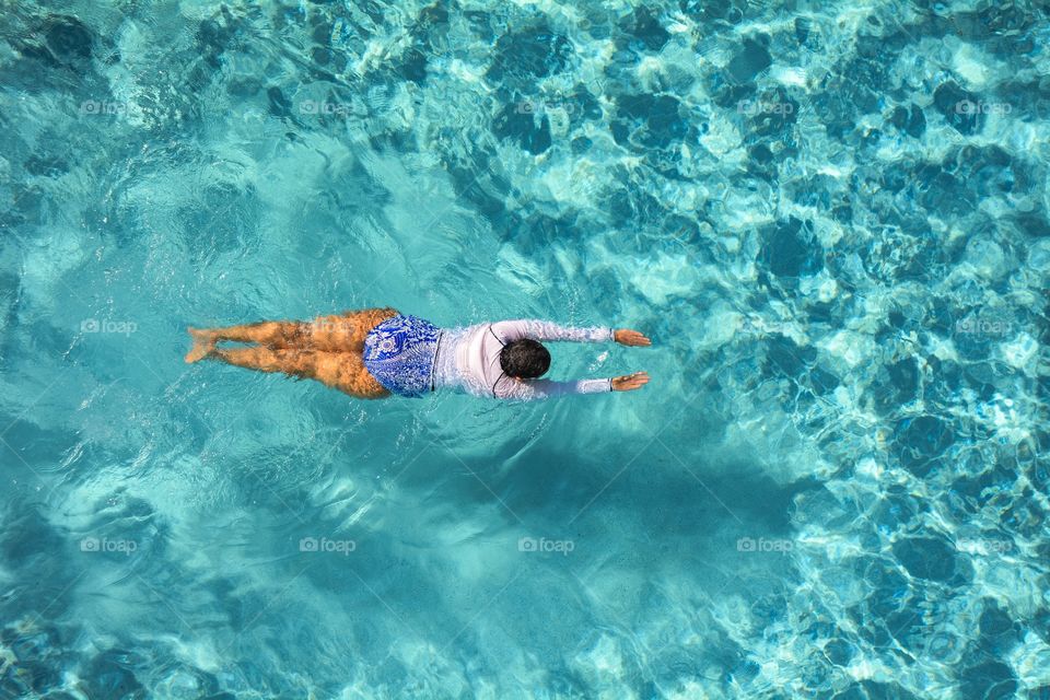 High angle view of a woman swimming