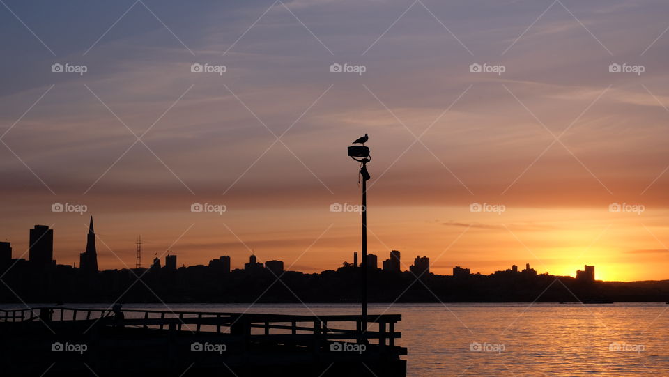 Sunny day alternating with cold fog ending with a spectacular sunset is a common sight in San Francisco.