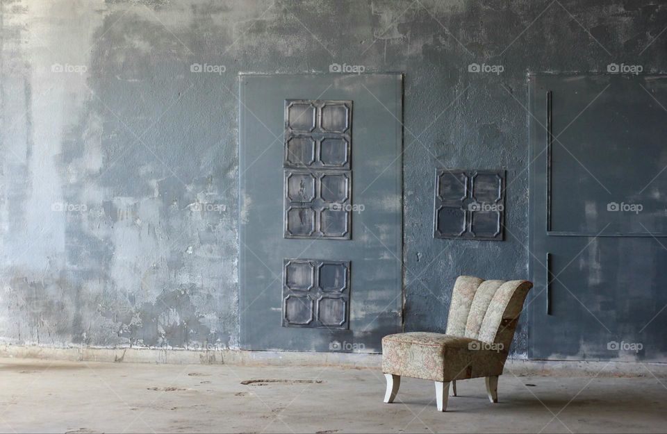 Lonely chair in empty room