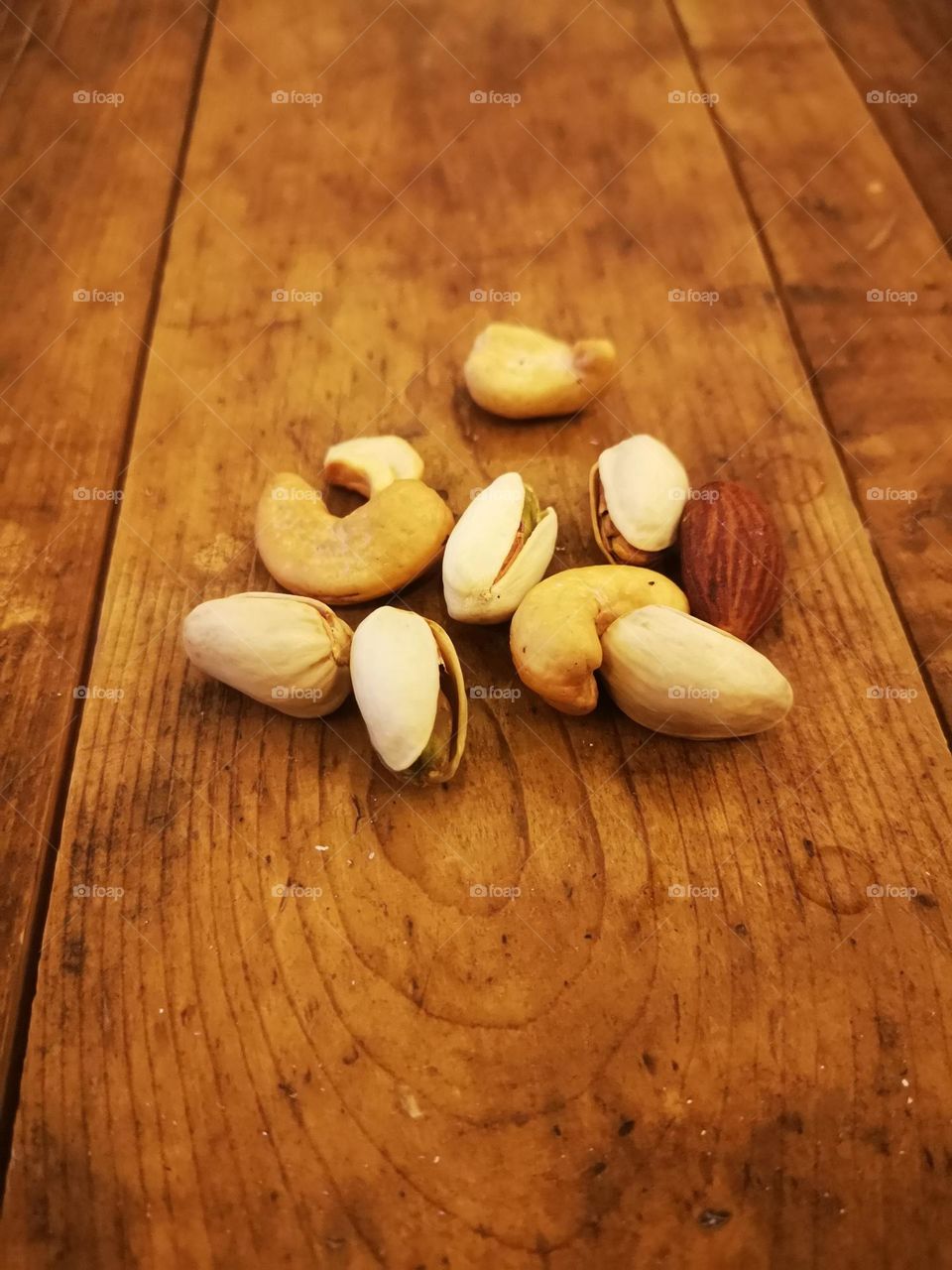 Walnuts, almonds and pistachios with coffee and tea