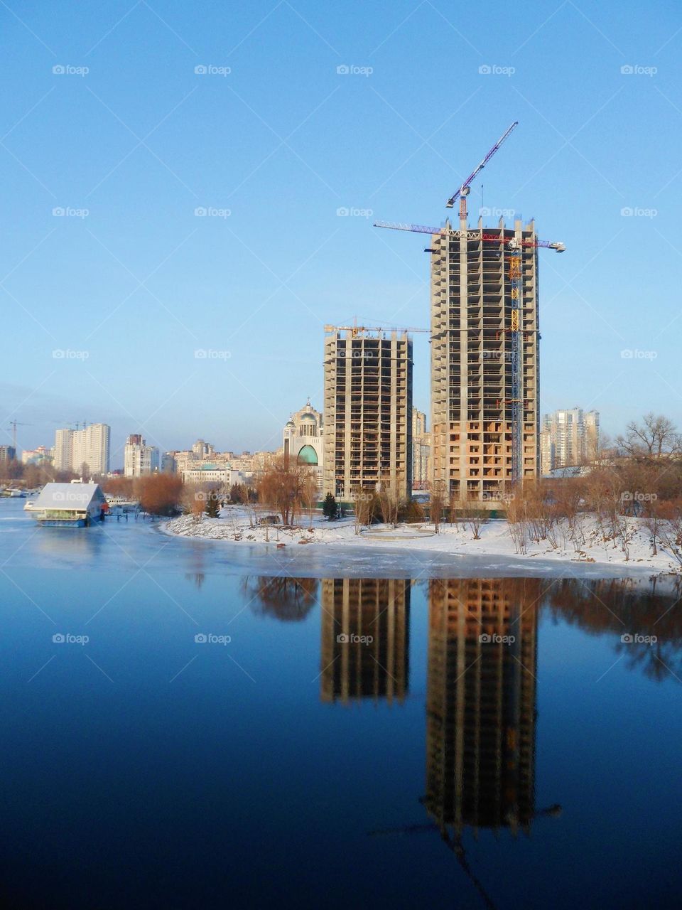 reflection of the building on the river