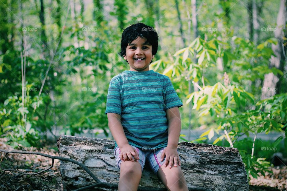 Happy kid in nature and outdoor 