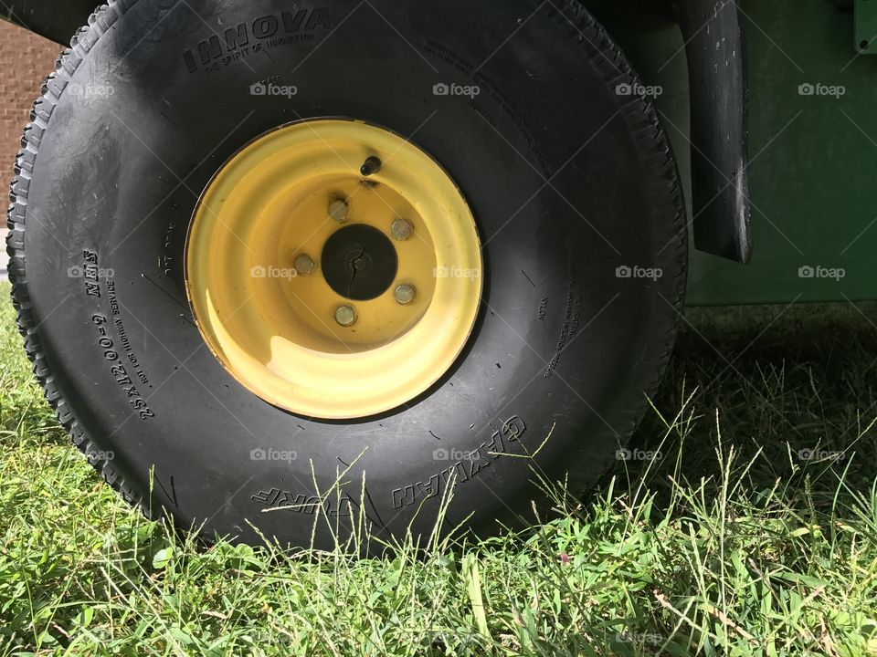 Round and round yellow tire goes. 