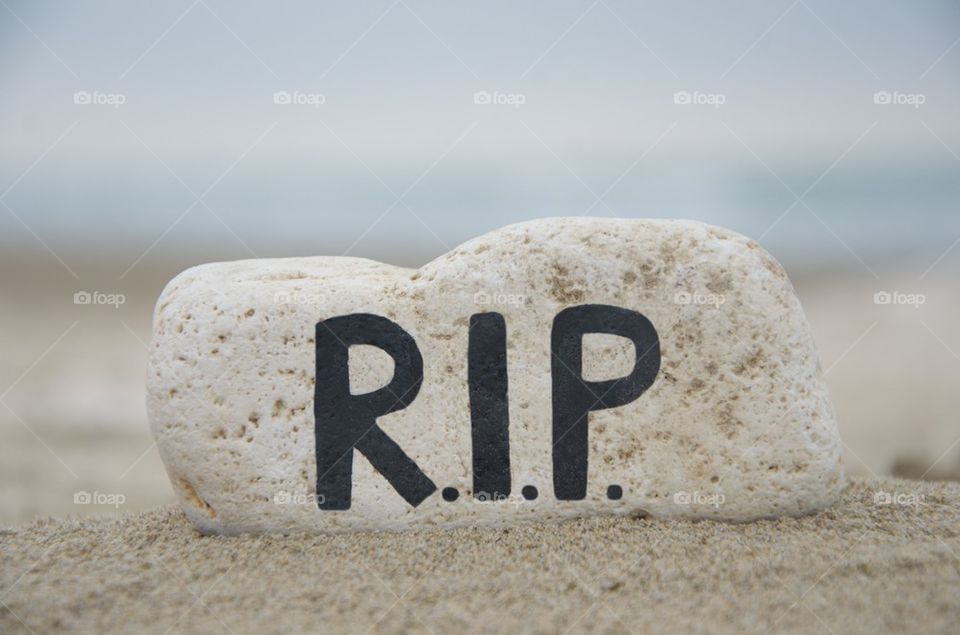 R.I.P. concept on a stone