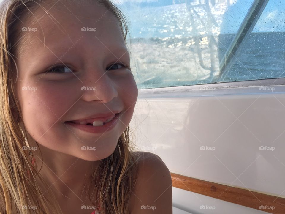 Young girl on a boat