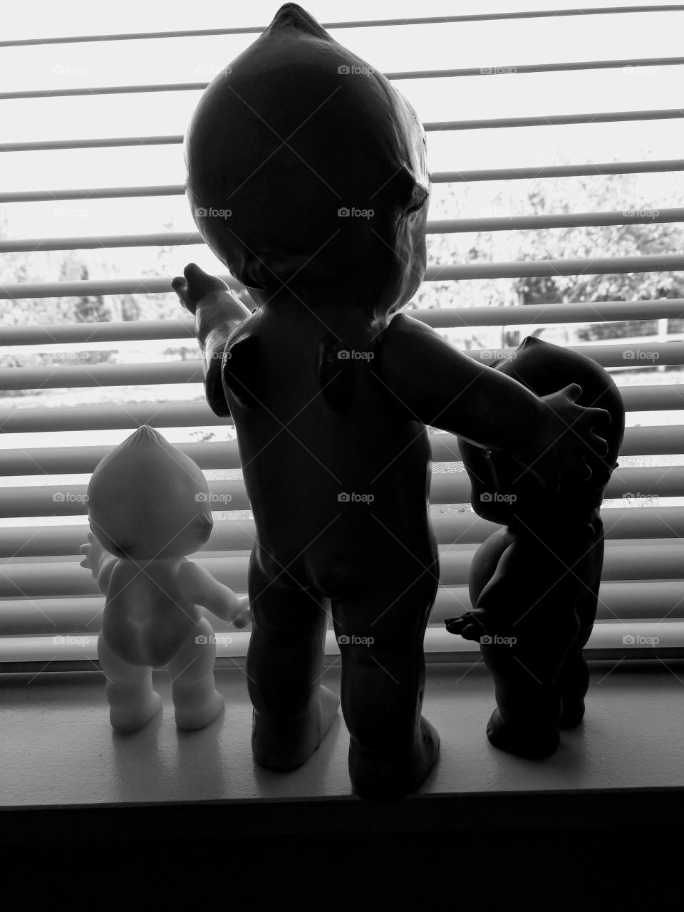 Kewpie family dolls window silhouette