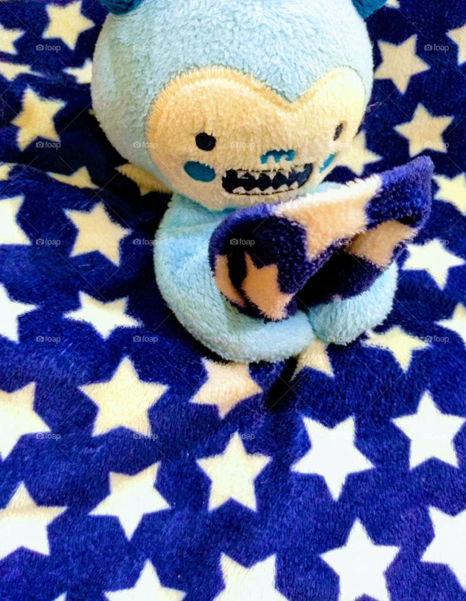 baby monster toy with stars