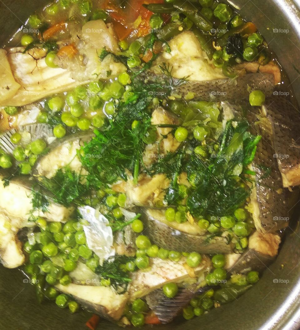 steamed fish curry with peas