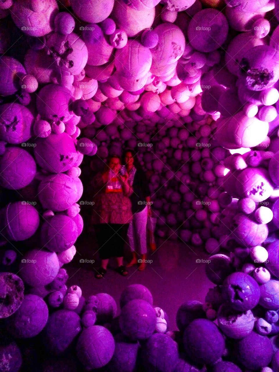Purple spheres art installation walk through with 2 people 