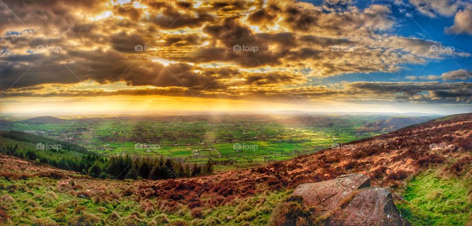 Ray's of light through the clouds.  Ireland's landscape Panoramic. landscape, panoramic, ireland, nature, travel, view, scenic, irish, sky, blue, europe, tourism, landmark, beautiful, outdoor, castle, green, cloud, countryside, natural, scenery