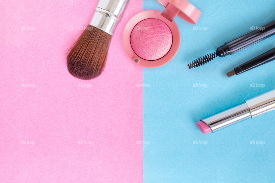 Makeup on pink and blue background